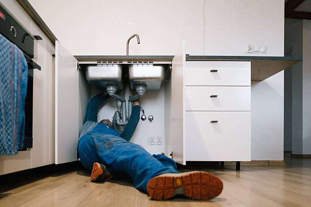 Professional Drain Cleaning technician working in Carthage, TX